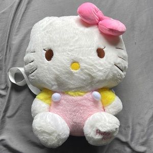 Brand Hello Kitty. Size is OS. Color is white, pink, yellow and brown (: